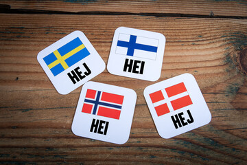 Nordic language greetings with Scandinavian country flags