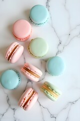Obraz premium Colorful Macarons with Soft Pastel Shades on Marble Table