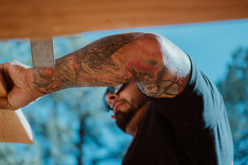 A Hardworking Construction Tattooed Man