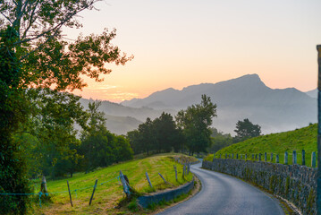 road to the mountains during sunrise