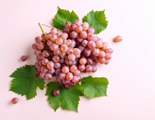 A bunch of grapes in abstract style, accented by scattered leaves on a plain surface