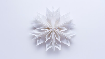 Paper snowflake isolated on white backdrop