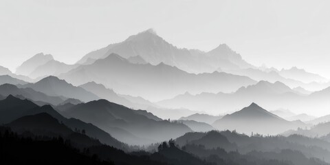 Obraz premium Misty grayscale mountain range, layered peaks