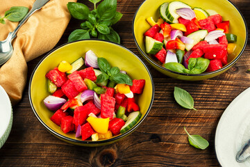 Original healthy salad of watermelon, cucumber.