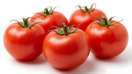 Fresh red tomatoes on a white background.