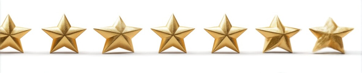 Fototapeta premium A row of five golden stars on a white background, top view, high-resolution photography.