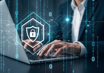 Cybersecurity professional working on a laptop with digital security shield overlay