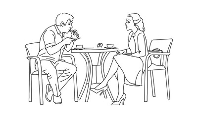 Two People Sitting at a Table in a Cafe