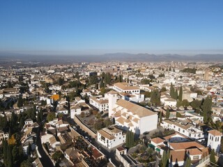 Golden Fall Drone View of Alhambra – Sunlit Fortress in Granada, Spain