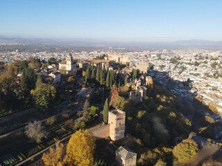 Golden Fall Drone View of Alhambra – Sunlit Fortress in Granada, Spain