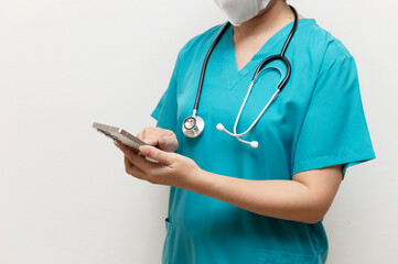 Doctor using smartphone for medical communication.j