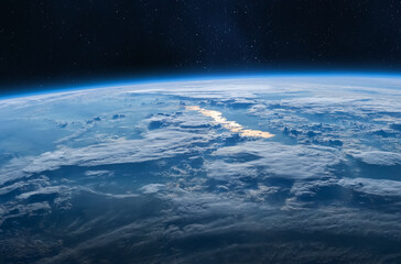 This stunning blue planet Earth with world ocean and clouds in outer space on a starry sky....