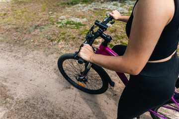 Front wheel of a bicycle, highlighting the disc brake system. Disc brakes offer excellent braking...