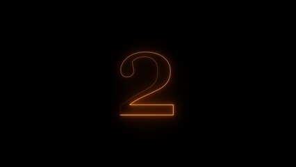 Glowing orange number two illuminated in the dark with a bright light source