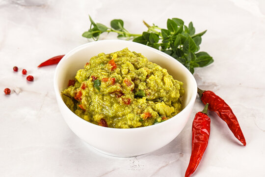 Guacamole with avocado, tomato and chili