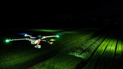 Agricultural drones flying over green farmland at night. Showcasing efficient farming technology, smart agriculture, cultivation, automation, and modern drone surveillance in agritech.