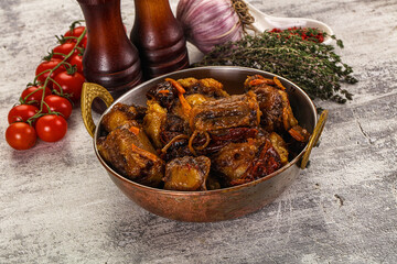 Baked oztail with tomato and carrot