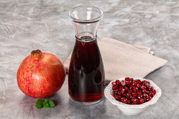 Sweet fresh pomegranate juice with fruit