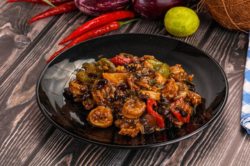Squid with vegetables in oyser sauce