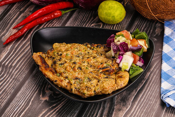 Tasty chicken steak with vegetables