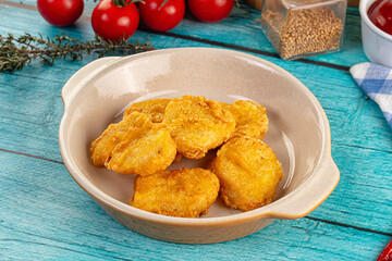 Golden crispy fried chicken nuggets