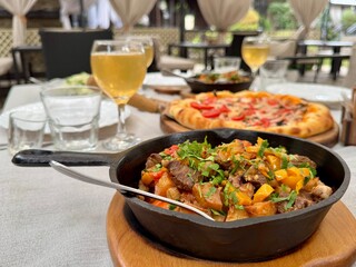 Fried potatoes with meat