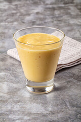 Sweet mango smoothie dessert glass