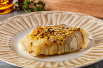 Steamed cod fish fillet with spices