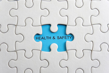Fototapeta premium Health and Safety Puzzle Piece, Conceptual Image Representing Workplace Security, Protection, and Well-being for a Secure Environment