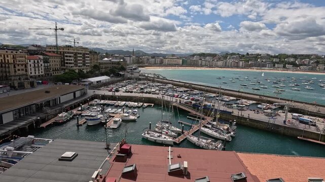 High angle view of San Sebastian marina, harbour in La Concha bay