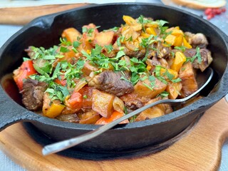 Fried potatoes with meat