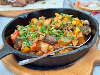 Fried potatoes with meat