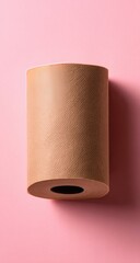 Rolled light brown paper against a pink background