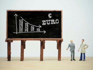 Mini toy of action figure at table with blurred background. Business photography concept design....