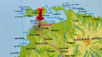 View of Darwin, is the capital city of the Northern Territory, Australia, on a geographical map of Australia and New Zealand, marked with red pushpin