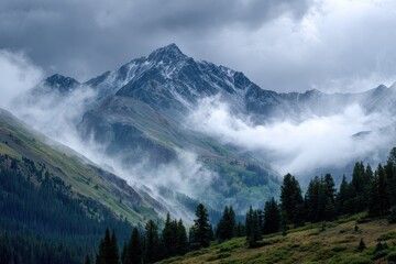 Majestic Clouds Drifting Over Peaks in Colorado's San Juan Mountain Range: A Southwest Blanket Experience