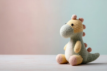 Handmade Crocheted Amigurumi Dinosaur with Soft Pastel Background
