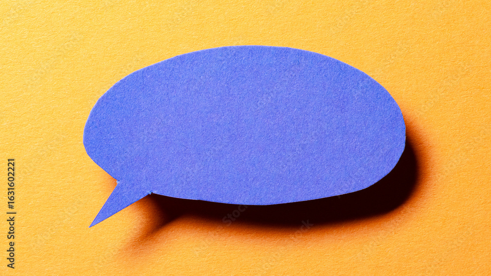 Poster blue blank cut out paper speech bubble with drop shadow and copy space for text on orange background