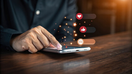 Man using mobile phone for social media engagement likes and comments online marketing strategy content creation