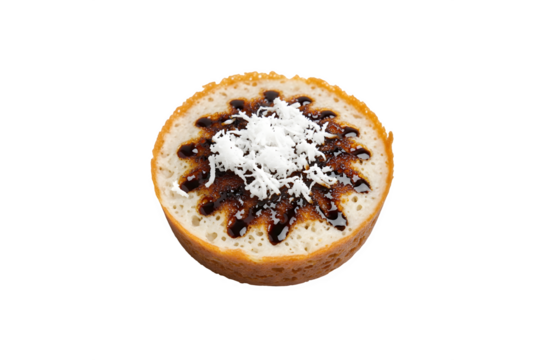 Serabi is a classic Indonesian treat made from a blend of rice flour and coconut milk. It's baked in a round mold using traditional methods and topped with grated coconut and brown sugar syrup