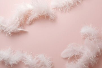 Obraz premium White feathers. Soft, fluffy feathers on pastel pink background. Flat lay composition. Minimalist style. n Selective focus.