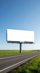 Fototapeta premium Blank billboard on a highway with a clear sky.