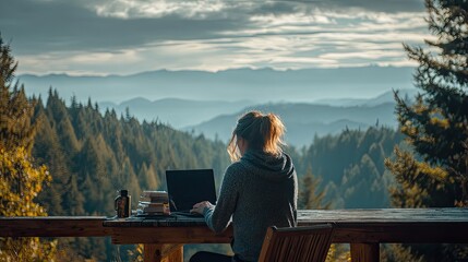 A picture of a woman working with a laptop in the middle of nature, on a wooden balcony with a view of mountains and pine forests as far as the eye can see. The atmosphere is peaceful and beautiful, s