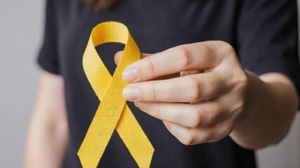 Suicide prevention day, Sarcoma, bone, bladder and Childhood cancer Awareness month, Yellow Ribbon for supporting people living and illness. children Healthcare and World cancer day concept