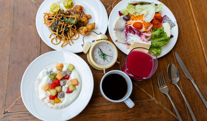 Alarm clock with IF (Intermittent Fasting) 16 and 8 diet rule and weight loss concept.-Diet plan concept