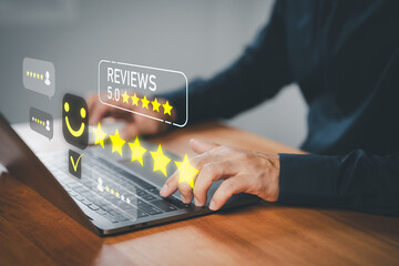 Customer giving 5 star review online using laptop, showing satisfaction and positive feedback, ideal for business reputation, testimonial, customer experience, marketing, and e-commerce concept.