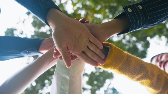 ESG,empathy,partnership and Social connection.Business people join hands together for CSR,corporate social responsibility.World environment day.Global community teamwork.Charity,volunteer, partnership