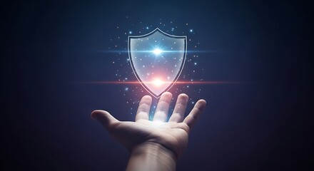 Hand holding a glowing shield representing cybersecurity and data protection