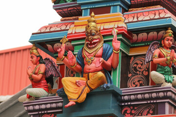 Majestic stone sculpture of Lord Narasimha (Nrisimhadeva) – fierce avatar of Hindu god Vishnu,...