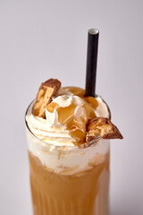 Indulgent Creamy Dessert Beverage Featuring Whipped Topping, Crunchy Cookie Pieces, and Drizzled...